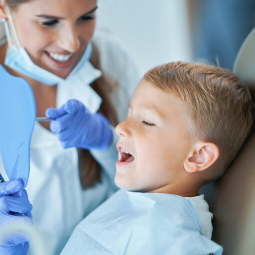 Little Boy And Female Dentist In The Dentists Office kids dentist heathmont - Heathmont Dental clinic