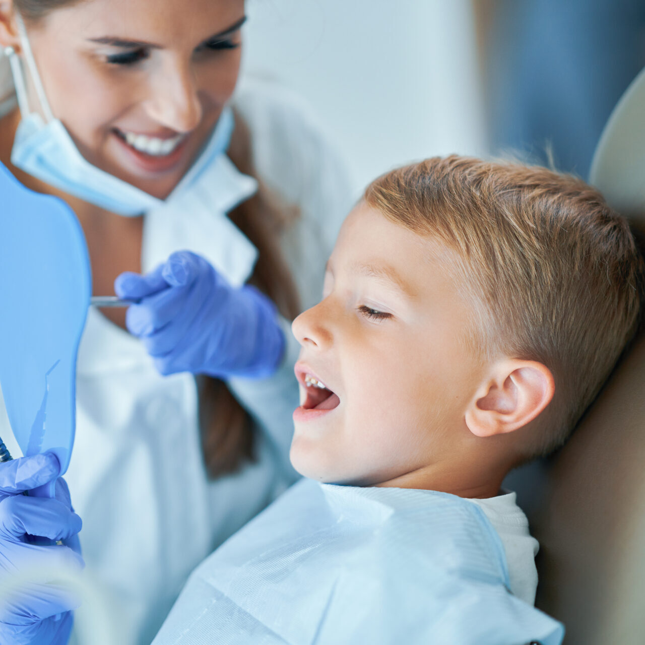 Little Boy And Female Dentist In The Dentists Office kids dentist heathmont - Heathmont Dental clinic