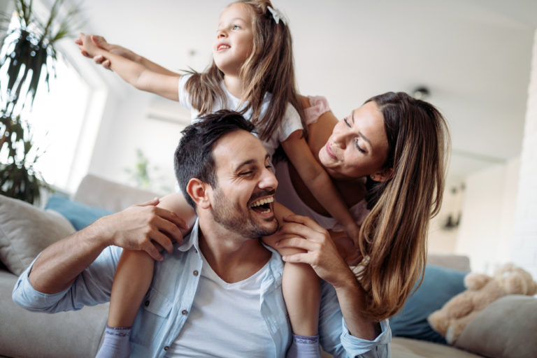 Happy family having fun time together at home