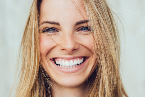 Portrait Of Young Woman With Beautiful Smile Portrait of young woman with beautiful smile